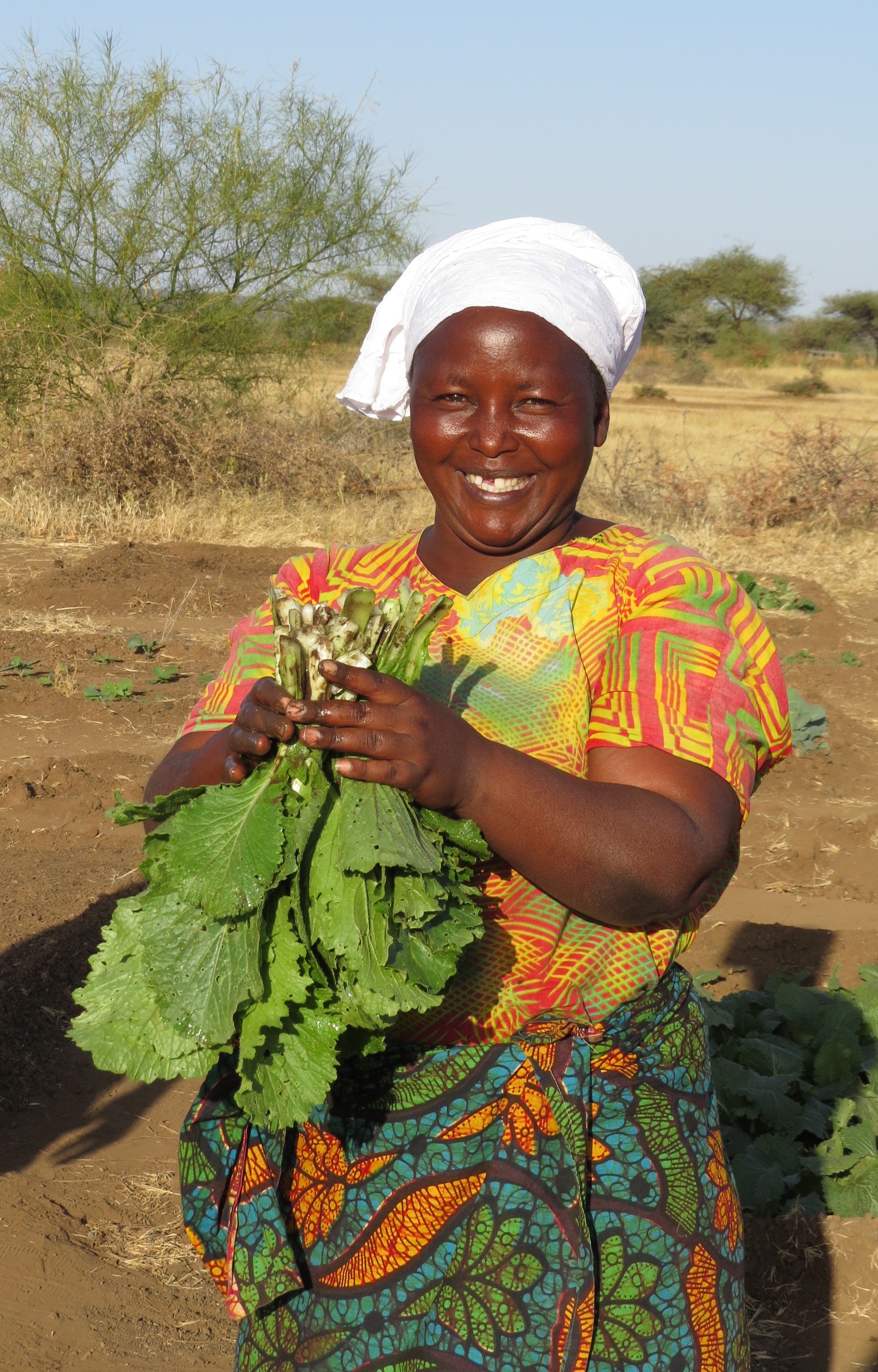 Photo of lady with fresh vegetables